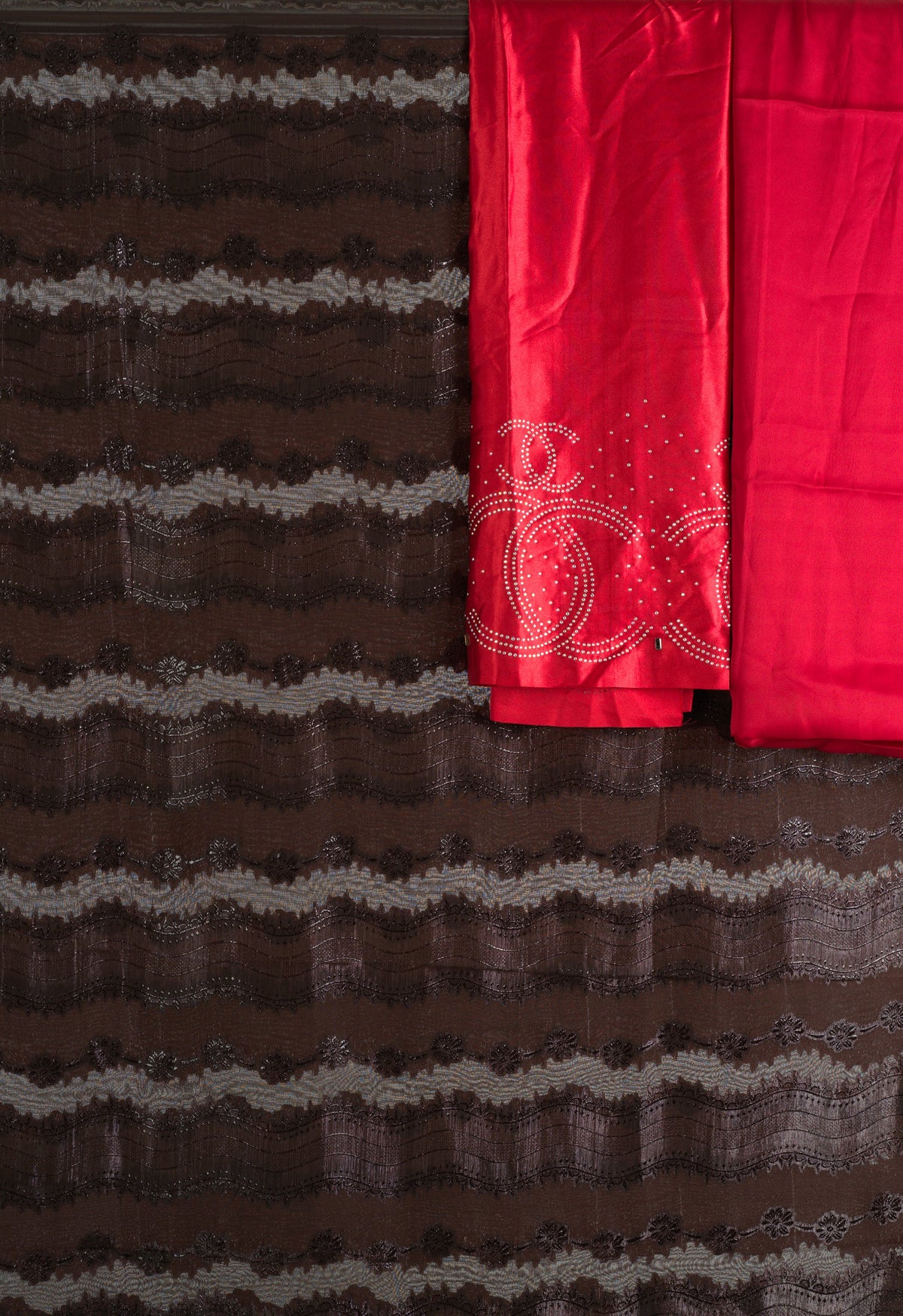 Brown and red floral Sharaax Dirac Kabayare
