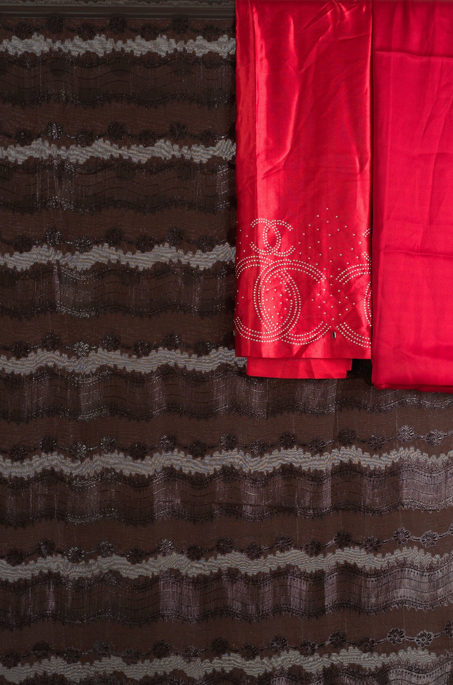Brown and red floral Sharaax Dirac Kabayare