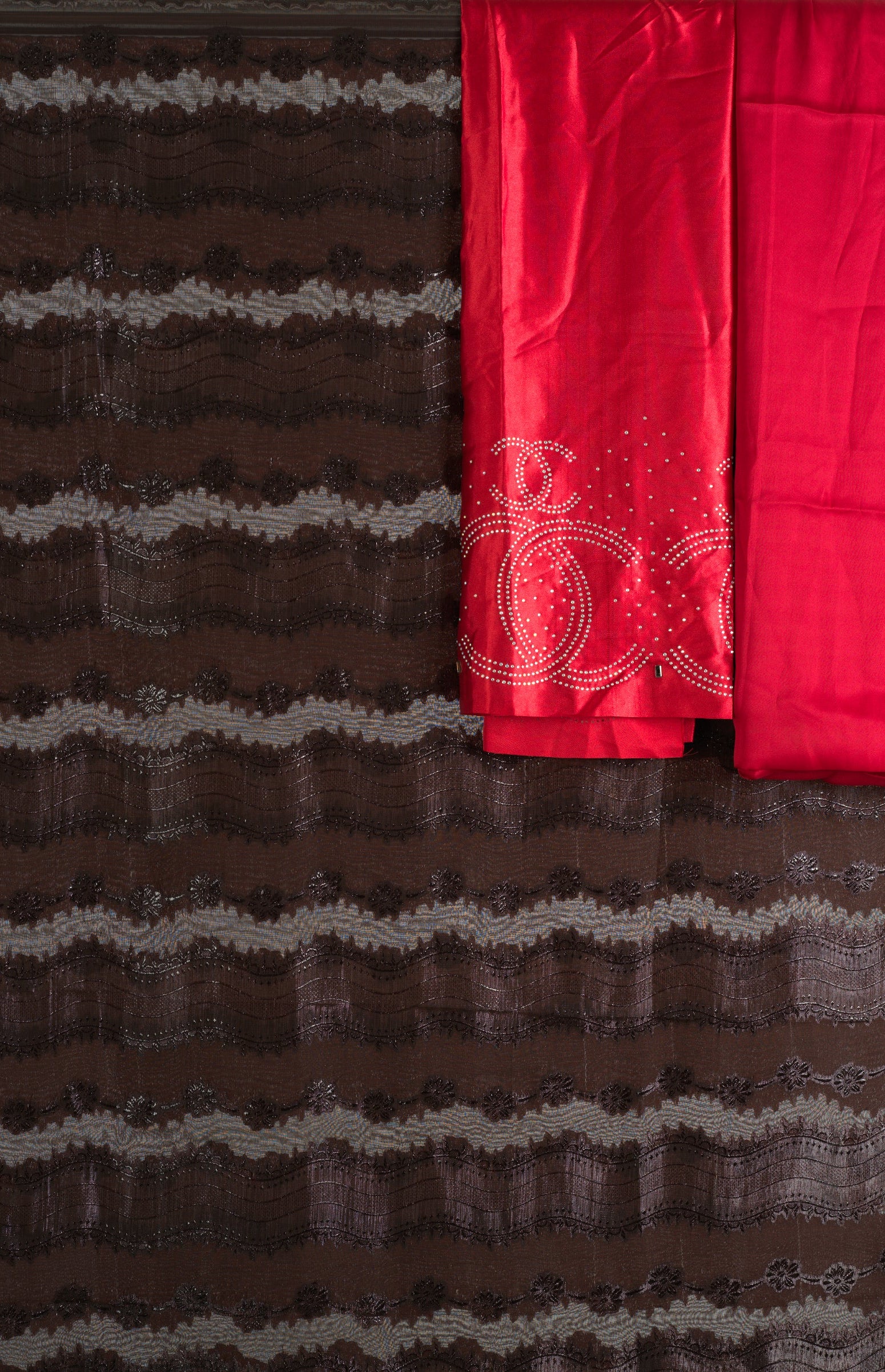 Brown and red floral Sharaax Dirac Kabayare