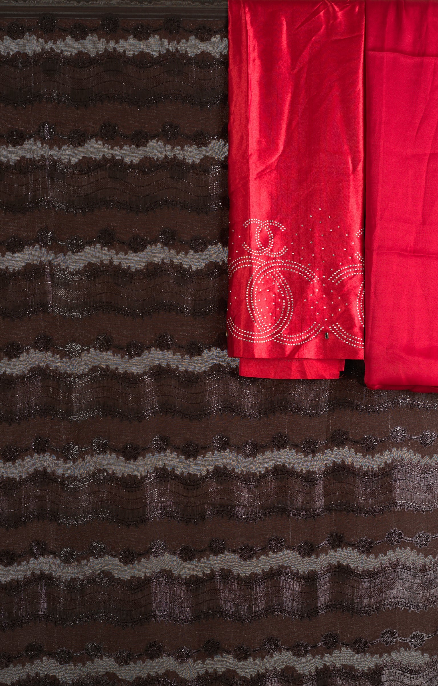 Brown and red floral Sharaax Dirac Kabayare