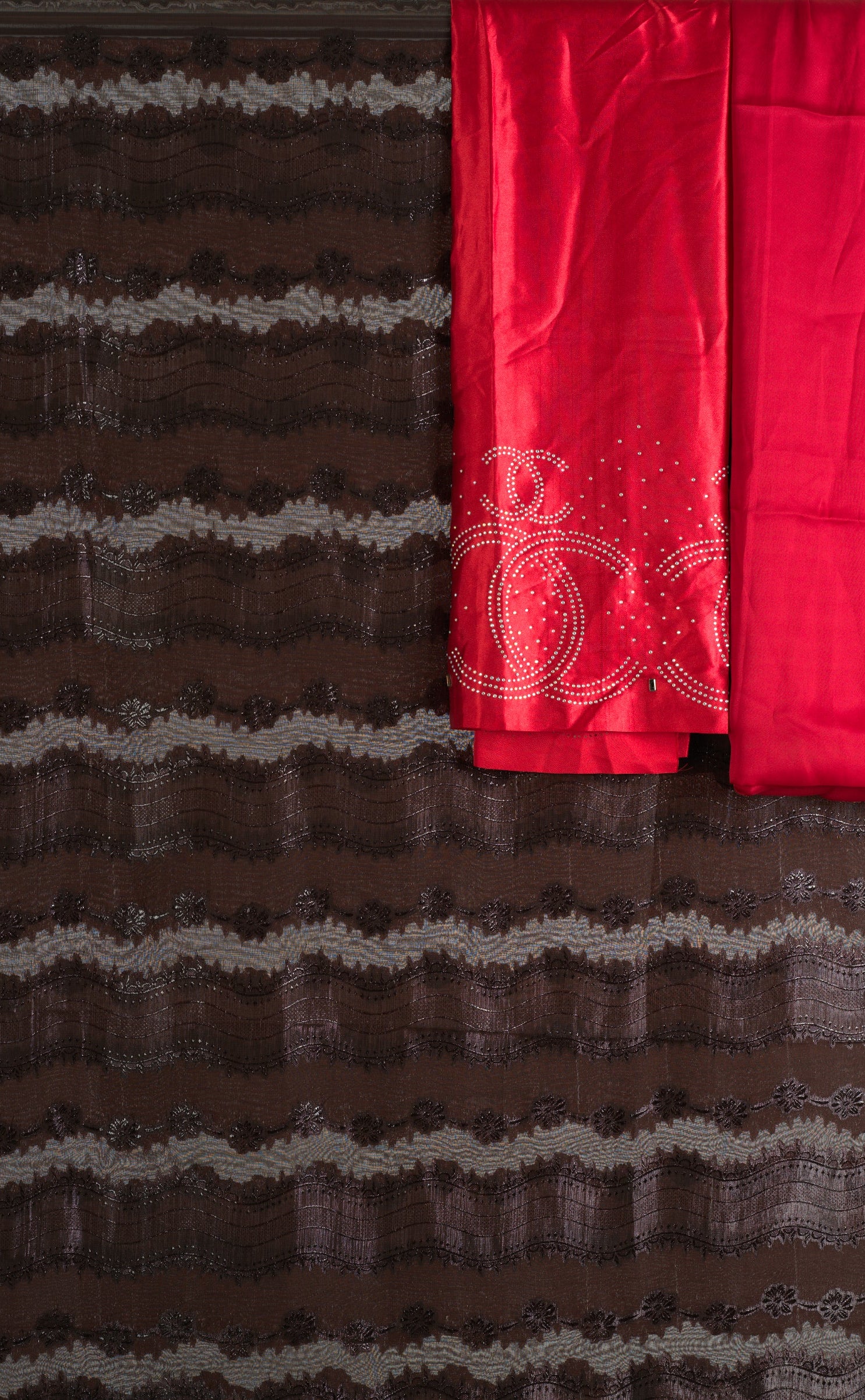 Brown and red floral Sharaax Dirac Kabayare
