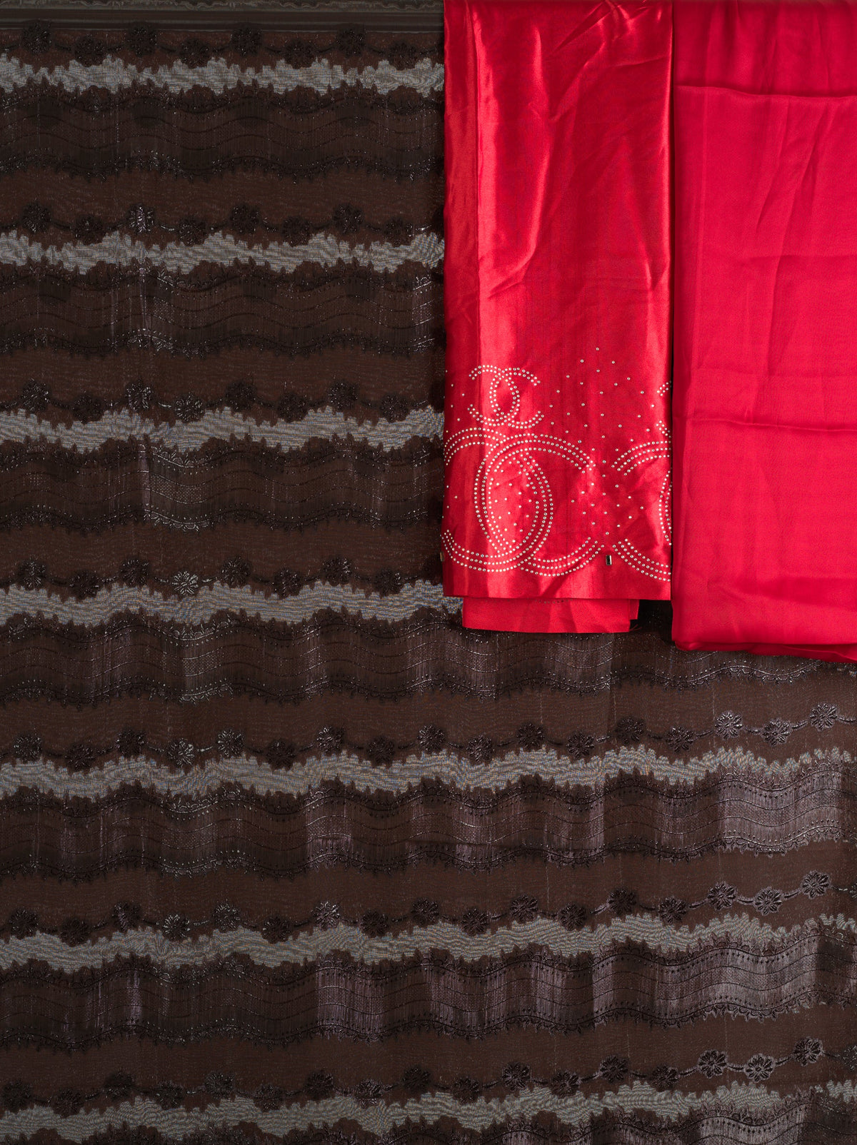 Brown and red floral Sharaax Dirac Kabayare