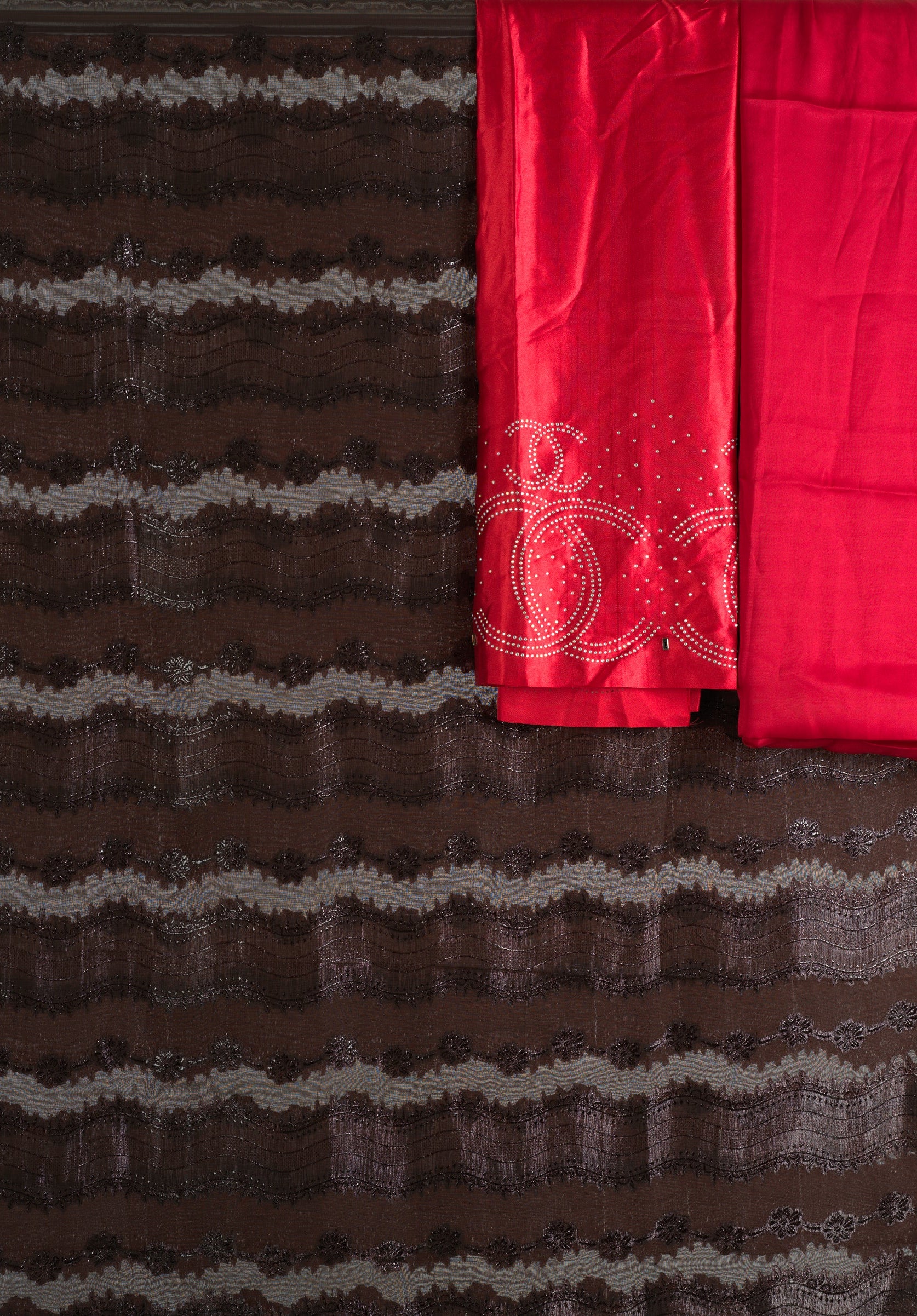 Brown and red floral Sharaax Dirac Kabayare
