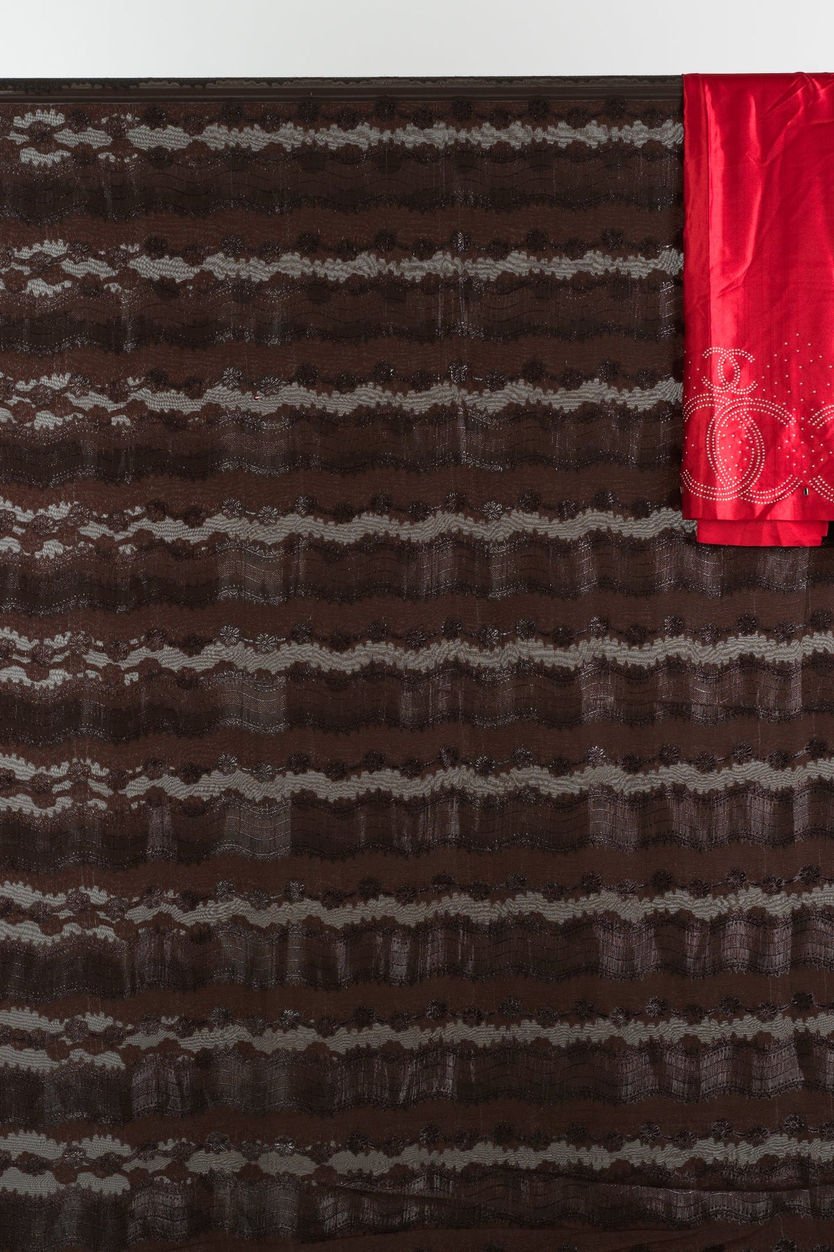 Brown and red floral Sharaax Dirac Kabayare
