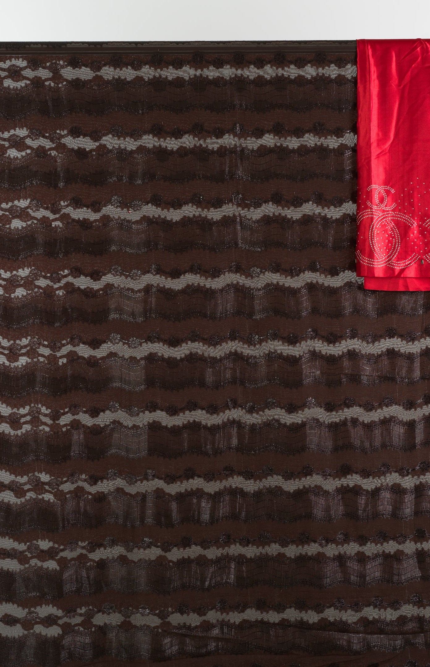 Brown and red floral Sharaax Dirac Kabayare