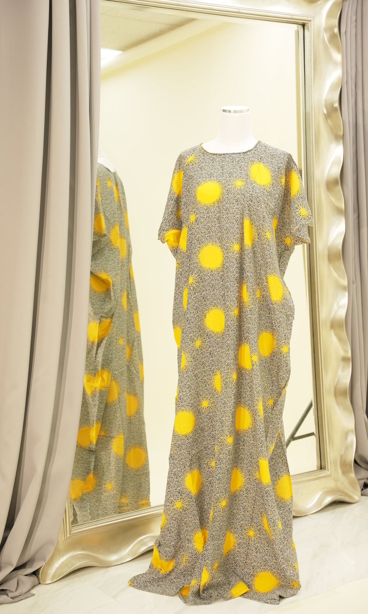 flashing sun print bati dress Kabayare