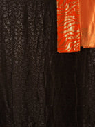 Brown and orange Sharaax Dirac KF