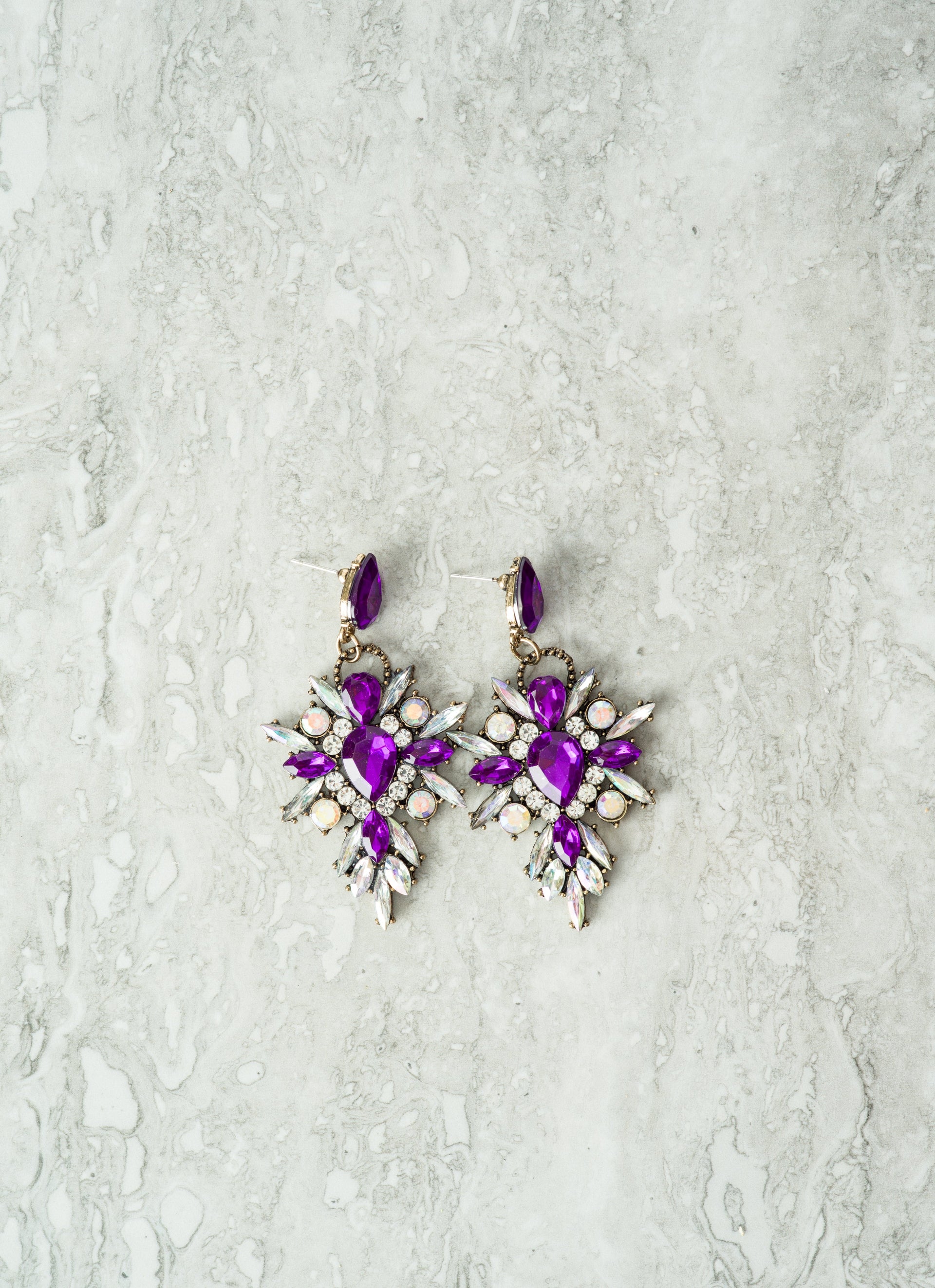 earrings on purple dress Purple outfits deserve the perfect pairing! Discover the best colors to  style with purple for an unforgettable look.  , Shop from our ,  Pre-Festive 60 to 80% off  FREE EARRINGS worth